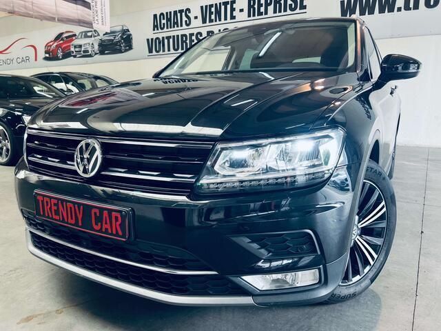 Zwart Occasion 2016 VW Tiguan Highline SUV | € 18.950 - Afbeelding 1/4