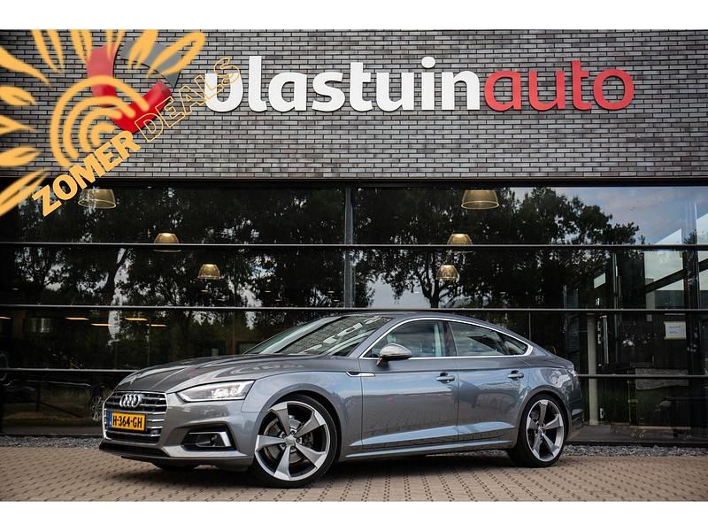 Grijs Gebruikt 2019 Audi A5 Design Coupé | € 26.950 (Eerlijke prijs) - Afbeelding 1/4
