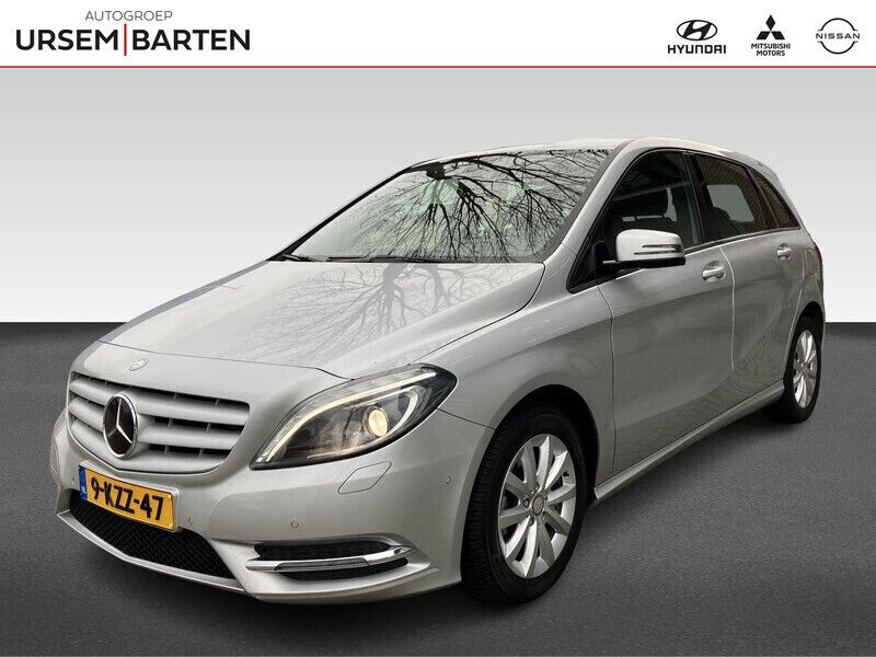 Grijs, metallic lak Gebruikt 2013 Mercedes B180 Ambition MPV | € 9.930 (Goede deal) - Afbeelding 1/4