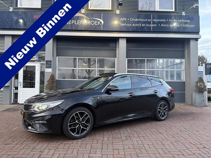 Zwart (metallic) Occasion 2018 Kia Optima GT-Line Stationwagen | € 18.950 (Eerlijke prijs) - Afbeelding 1/4