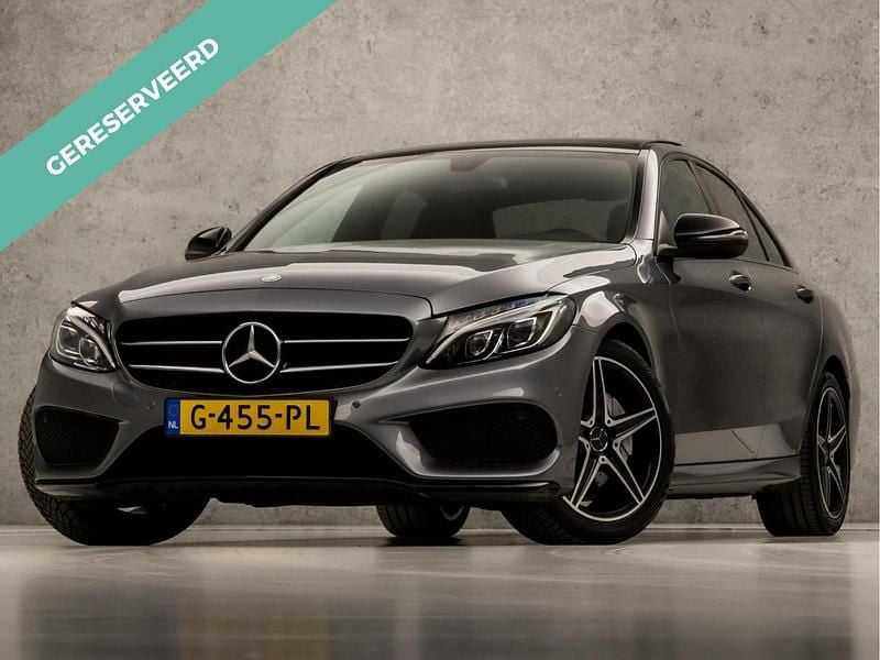 Grijs Gebruikt 2016 Mercedes C180 AMG Sedan | € 22.445 (Eerlijke prijs) - Afbeelding 1/4