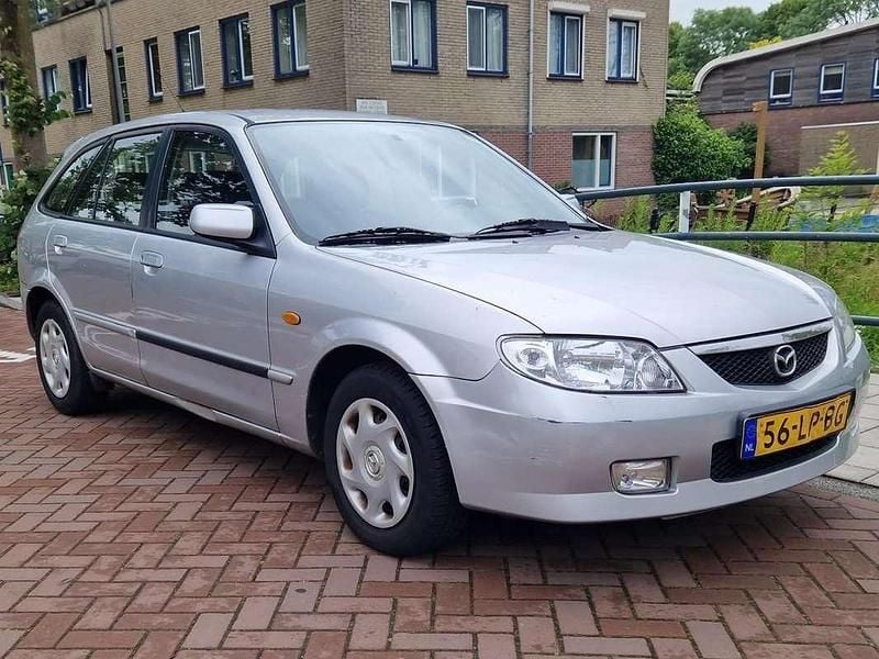 Zilver Gebruikt 2003 Mazda 323 Touring Hatchback | € 1.499 (Super prijs) - Afbeelding 1/4