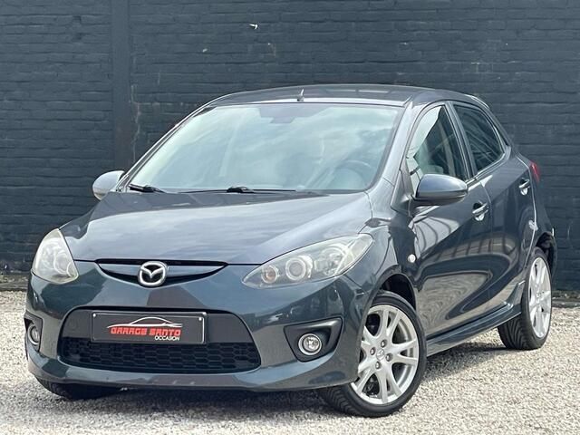 Grijs Gebruikt 2009 Mazda 2 Inclusive Sedan | € 2.490 (Goede deal) - Afbeelding 1/4