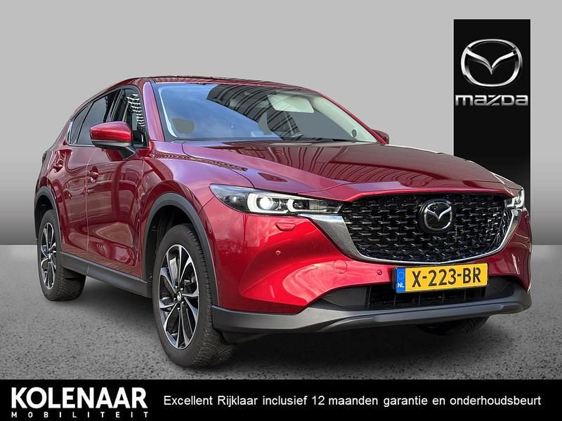 Soul red crystal m Gebruikt 2023 Mazda CX-5 Exclusive-Line SUV | € 36.395 (Eerlijke prijs) - Afbeelding 1/4