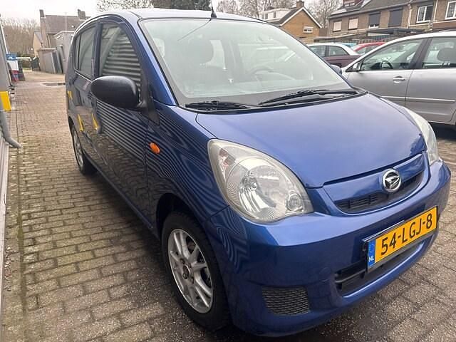 Occasion Daihatsu Cuore 69 PK (50 kW) 2010 Blauw Hatchback