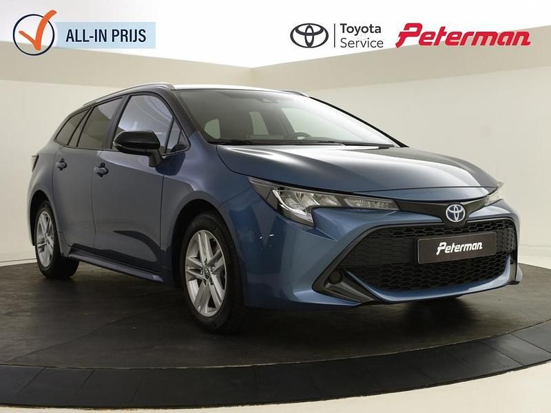 Blauw, metallic lak Gebruikt 2022 Toyota Corolla Active Stationwagen | € 23.799 (Eerlijke prijs) - Afbeelding 1/4