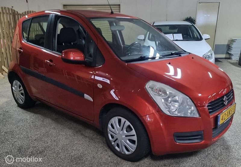 Oranje Gebruikt 2012 Suzuki Splash Hatchback | € 2.945 (Eerlijke prijs) - Afbeelding 1/4