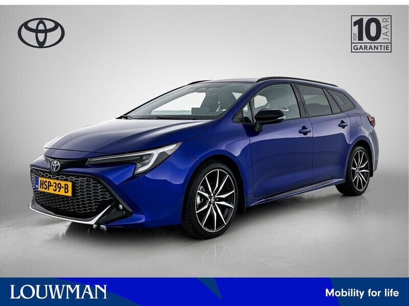 Blauw Gebruikt 2023 Toyota Corolla Hybrid Sport Stationwagen | € 32.450 - Afbeelding 1/3