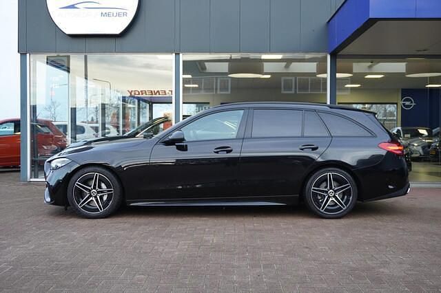Occasion Mercedes C200 AMG line 204 PK (150 kW) 2021 Zwart Stationwagen