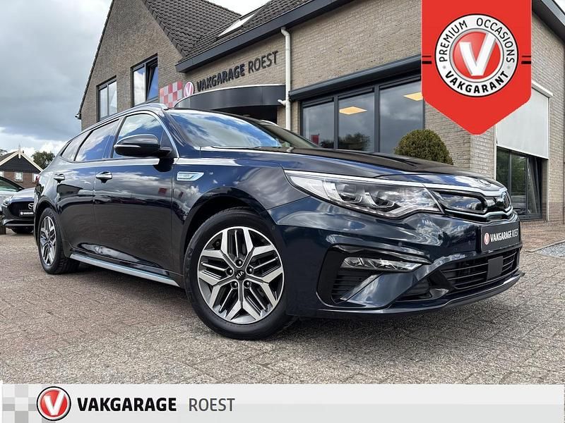 Blauw Gebruikt 2019 Kia Optima Hybrid Sedan | € 19.900 (Eerlijke prijs) - Afbeelding 1/4