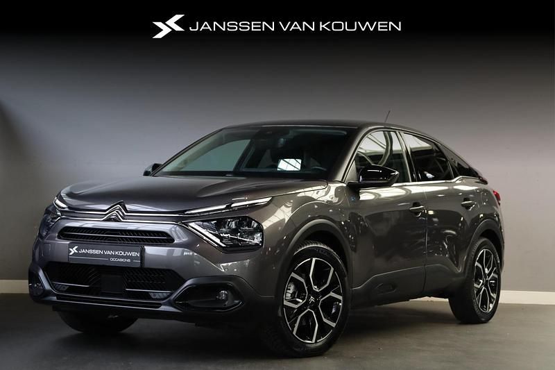 Grijs Gebruikt 2023 Citroën e-C4 Shine SUV | € 20.745 (Iets duurder) - Afbeelding 1/4