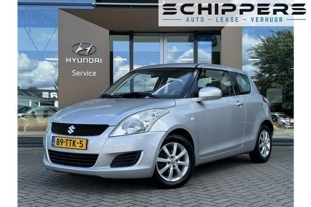 Grijs Gebruikt 2012 Suzuki Swift Comfort Hatchback | € 6.900 (Eerlijke prijs) - Afbeelding 1/4