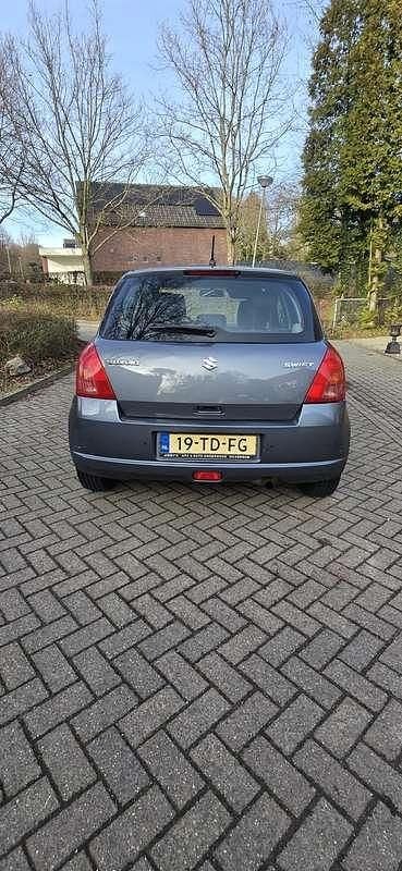 Occasion Suzuki Swift 92 PK (67 kW) 2006 Grijs Hatchback