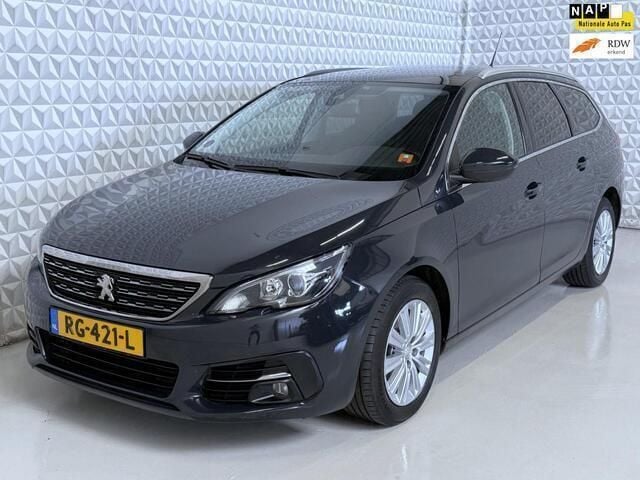 Grijs Gebruikt 2017 Peugeot 308 Premium Stationwagen | € 5.999 (Goede deal) - Afbeelding 1/4