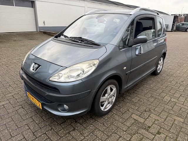 Grijs Gebruikt 2009 Peugeot 1007 MPV | € 1.995 (Eerlijke prijs) - Afbeelding 1/4