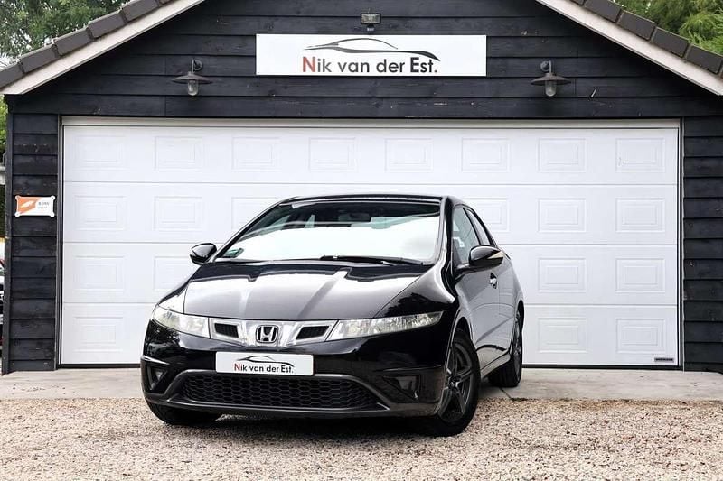 Zwart, metallic lak Gebruikt 2010 Honda Civic Comfort Hatchback | € 5.500 (Eerlijke prijs) - Afbeelding 1/4