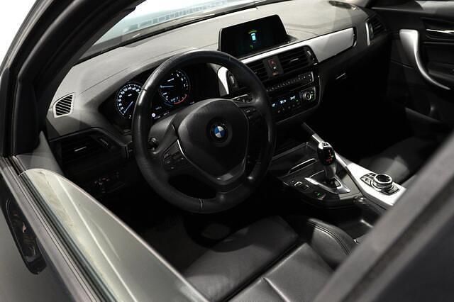 Occasion BMW 118 Executive 136 PK (100 kW) 2017 Zwart Hatchback