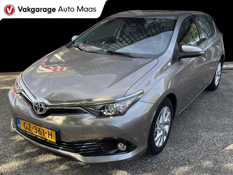 Bruin Gebruikt 2015 Toyota Auris Hatchback | € 12.800 (Eerlijke prijs) - Afbeelding 1/4