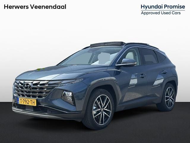 Dark teal metallic (tg8) Gebruikt 2023 Hyundai Tucson Premium SUV | € 37.935 (Eerlijke prijs) - Afbeelding 1/1