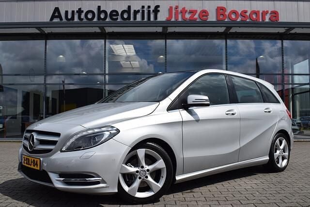 Grijs Gebruikt 2014 Mercedes B180 Ambition MPV | € 15.950 (Eerlijke prijs) - Afbeelding 1/4