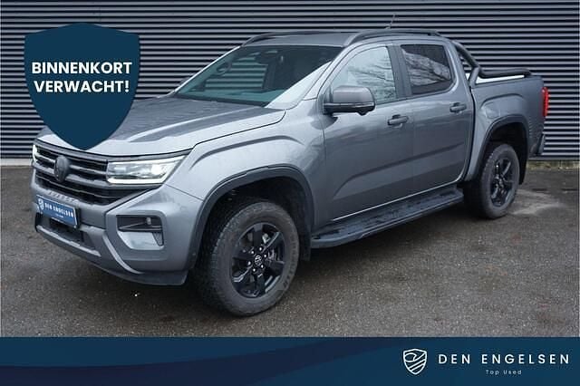 Grijs (metallic) Occasion 2024 VW Amarok PanAmericana Pickup | € 54.850 (Duur) - Afbeelding 1/4