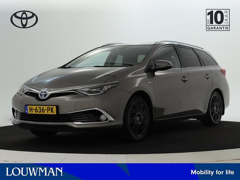 Bruin Gebruikt 2016 Toyota Auris Hybrid Executive Stationwagen | € 15.945 (Iets duurder) - Afbeelding 1/4
