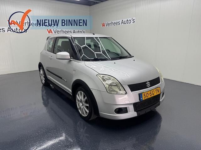Grijs Occasion 2006 Suzuki Swift Exclusive Hatchback | € 2.495 (Eerlijke prijs) - Afbeelding 1/4