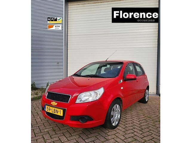 Rood Gebruikt 2010 Chevrolet Aveo LS Hatchback | € 1.799 (Eerlijke prijs) - Afbeelding 1/4