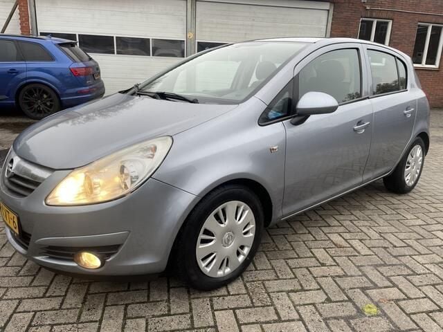 Grijs Gebruikt 2010 Opel Corsa Hatchback | € 1.499 (Goede deal) - Afbeelding 1/4