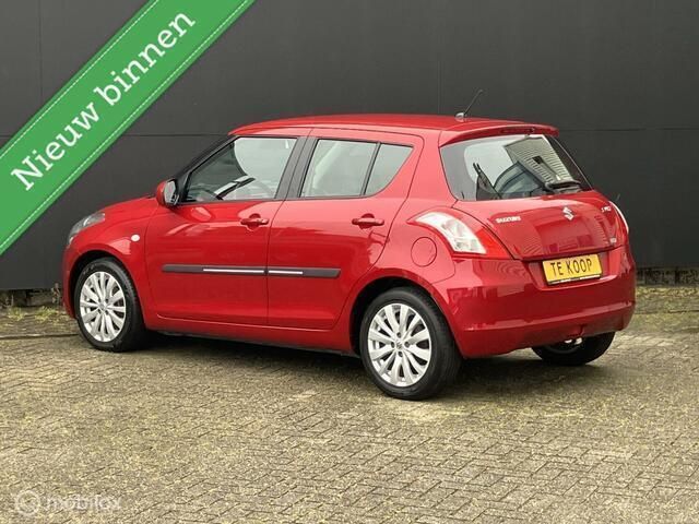 Occasion Suzuki Swift Exclusive 94 PK (69 kW) 2012 Rood Hatchback