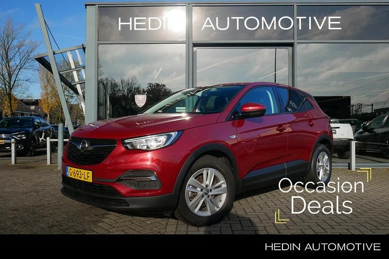 Rood Occasion 2019 Opel Grandland X Business Edition SUV | € 14.945 (Eerlijke prijs) - Afbeelding 1/4