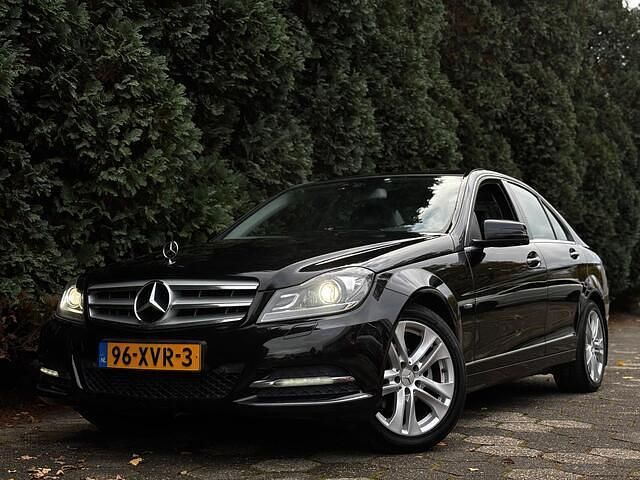 Zwart Occasion 2012 Mercedes C180 Avantgarde Sedan | € 11.950 (Eerlijke prijs) - Afbeelding 1/4
