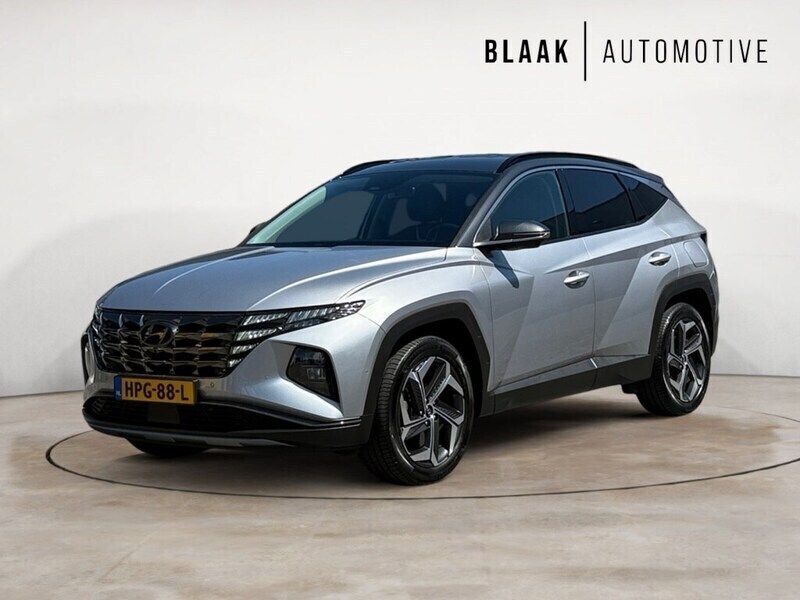 Grijs Gebruikt 2022 Hyundai Tucson Premium SUV | € 33.495 (Eerlijke prijs) - Afbeelding 1/4