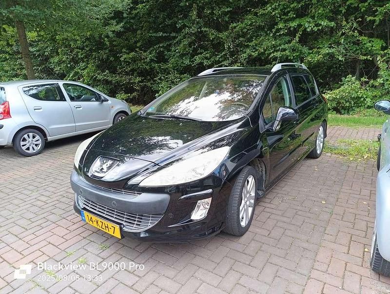 Zwart Gebruikt 2010 Peugeot 308 MPV | € 3.000 (Eerlijke prijs) - Afbeelding 1/4