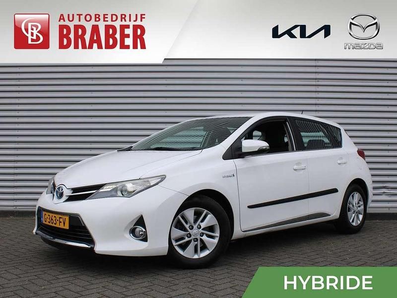 Wit, metallic lak Gebruikt 2015 Toyota Auris Hybrid Hatchback | € 14.700 (Eerlijke prijs) - Afbeelding 1/4