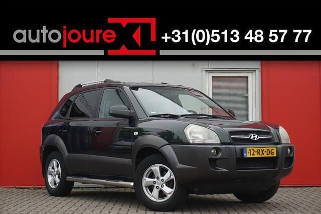 Groen, metallic lak Gebruikt 2006 Hyundai Tucson Style SUV | € 2.449 (Eerlijke prijs) - Afbeelding 1/4