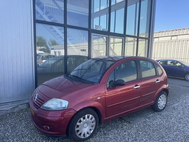 Rood Gebruikt 2004 Citroën C3 Exclusive Hatchback | € 950 (Goede deal) - Afbeelding 1/4