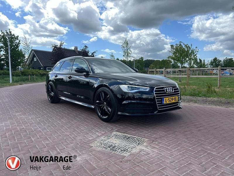 Zwart Gebruikt 2018 Audi A6 S-Line Stationwagen | € 26.245 (Eerlijke prijs) - Afbeelding 1/4