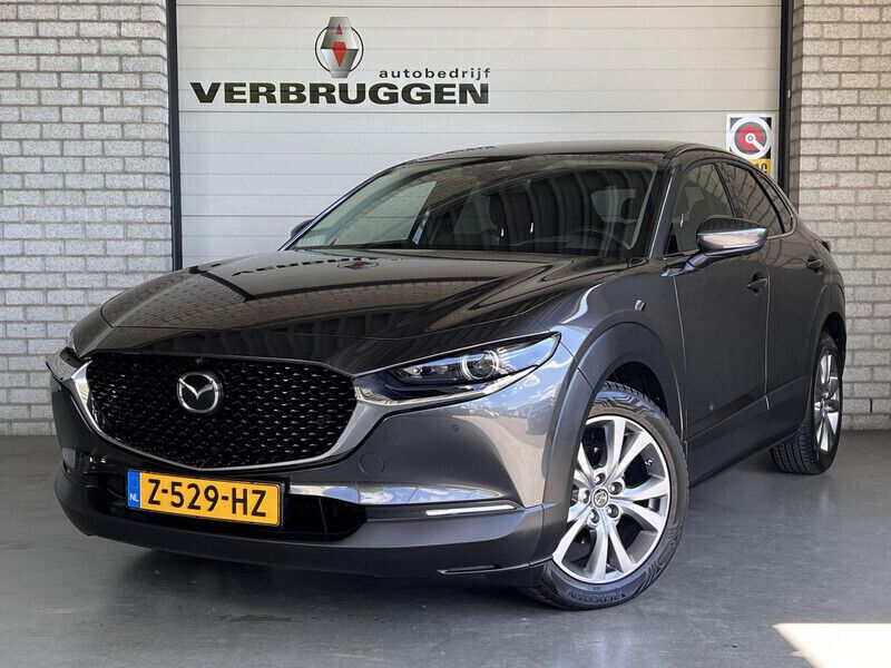 Grijs Gebruikt 2021 Mazda CX-30 Sportive SUV | € 28.495 (Eerlijke prijs) - Afbeelding 1/4