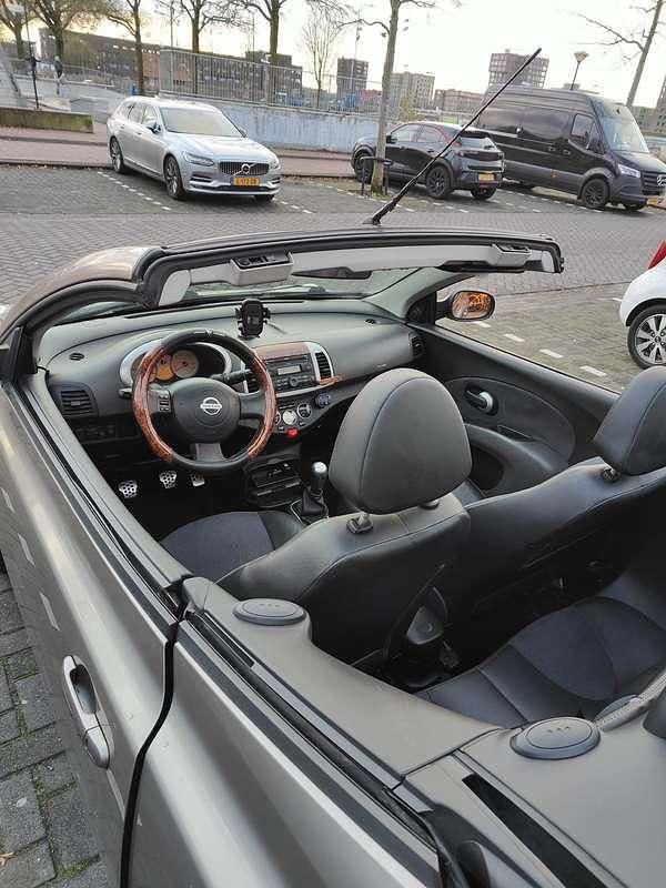 Bruin Gebruikt 2006 Nissan Micra Tekna+ Cabriolet | € 2.700 (Eerlijke prijs) - Afbeelding 1/4
