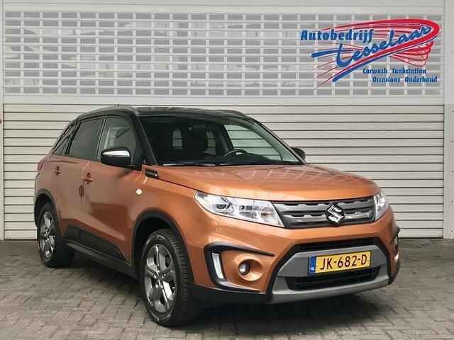 Oranje Gebruikt 2016 Suzuki Vitara Exclusive SUV | € 15.700 (Eerlijke prijs) - Afbeelding 1/4