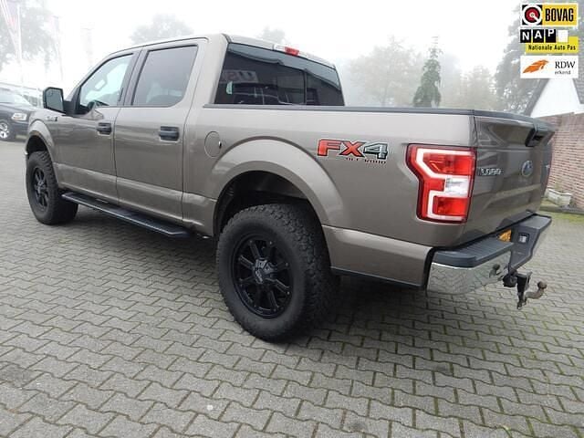 Grijs Gebruikt 2019 Ford V8 XLT Van | € 34.950 - Afbeelding 1/4