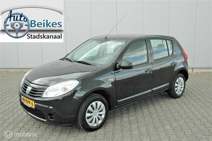 Zwart (metallic) Gebruikt 2010 Dacia Sandero Hatchback | € 1.450 (Goede deal) - Afbeelding 1/4
