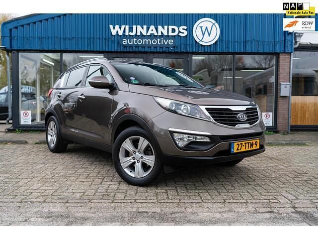 Bruin Occasion 2012 Kia Sportage Plus SUV | € 9.495 (Eerlijke prijs) - Afbeelding 1/4