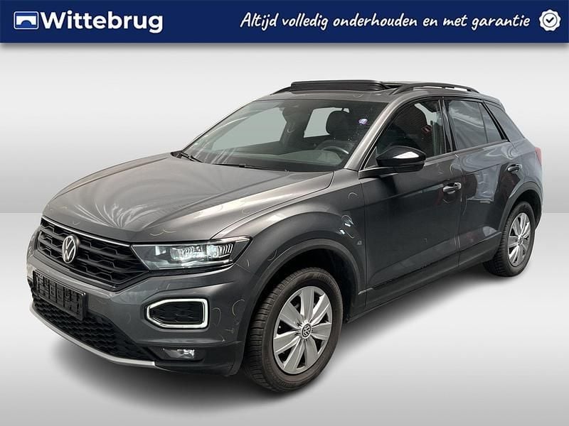Grijs, metallic lak Gebruikt 2021 VW T-Roc Sportline SUV | € 30.950 (Eerlijke prijs) - Afbeelding 1/2