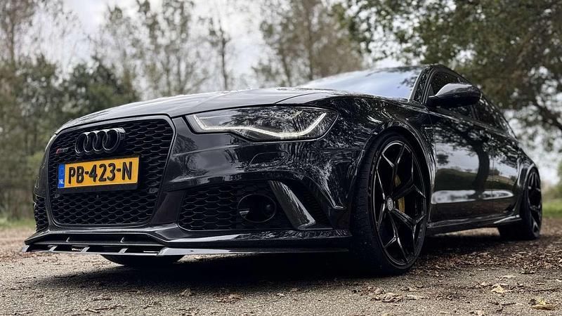 Zwart Gebruikt 2013 Audi RS6 Stationwagen | € 39.950 - Afbeelding 1/4