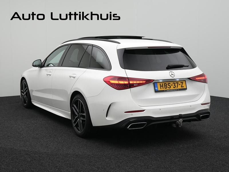 Occasion Mercedes C200 AMG line 204 PK (150 kW) 2021 Wit Stationwagen