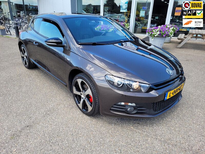 Bruin Gebruikt 2012 VW Scirocco Highline Coupé | € 11.200 (Iets duurder) - Afbeelding 1/4