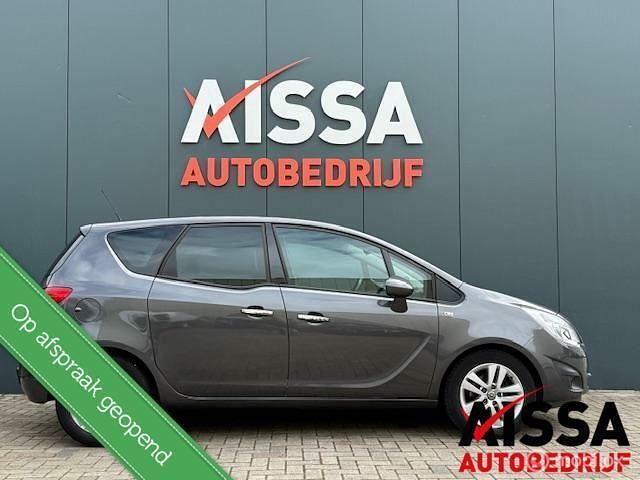 Grijs Gebruikt 2011 Opel Meriva Cosmo MPV | € 4.899 (Eerlijke prijs) - Afbeelding 1/4
