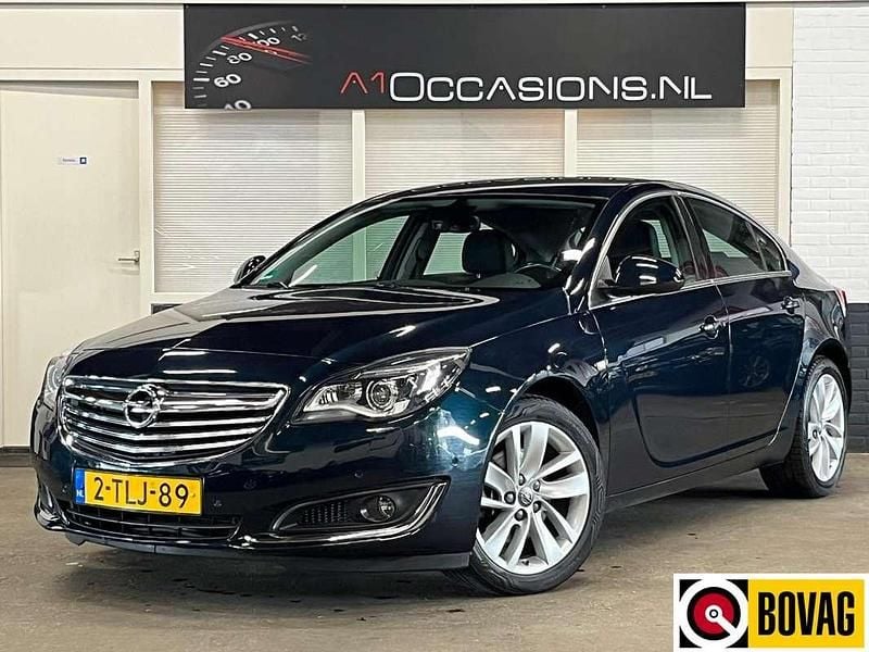 Groen Gebruikt 2014 Opel Insignia Cosmo Hatchback | € 7.995 (Goede deal) - Afbeelding 1/4